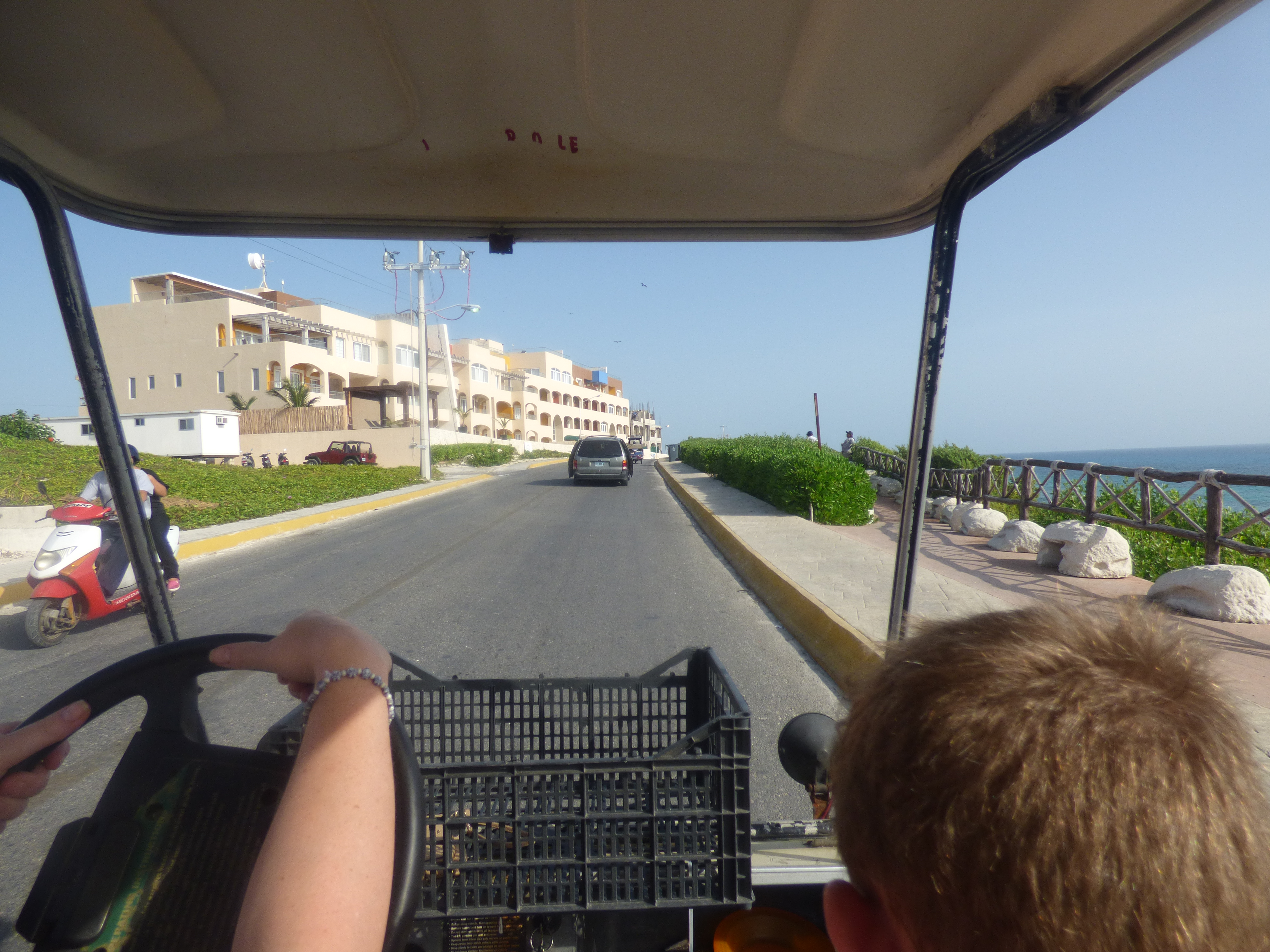 Riding in a golf cart